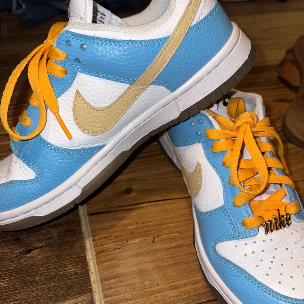 Nike Blue and White Sneakers with Tan and Orange Accents